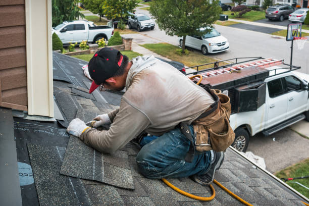 Professional Flat Roof Repair technician working in Myra, WV
